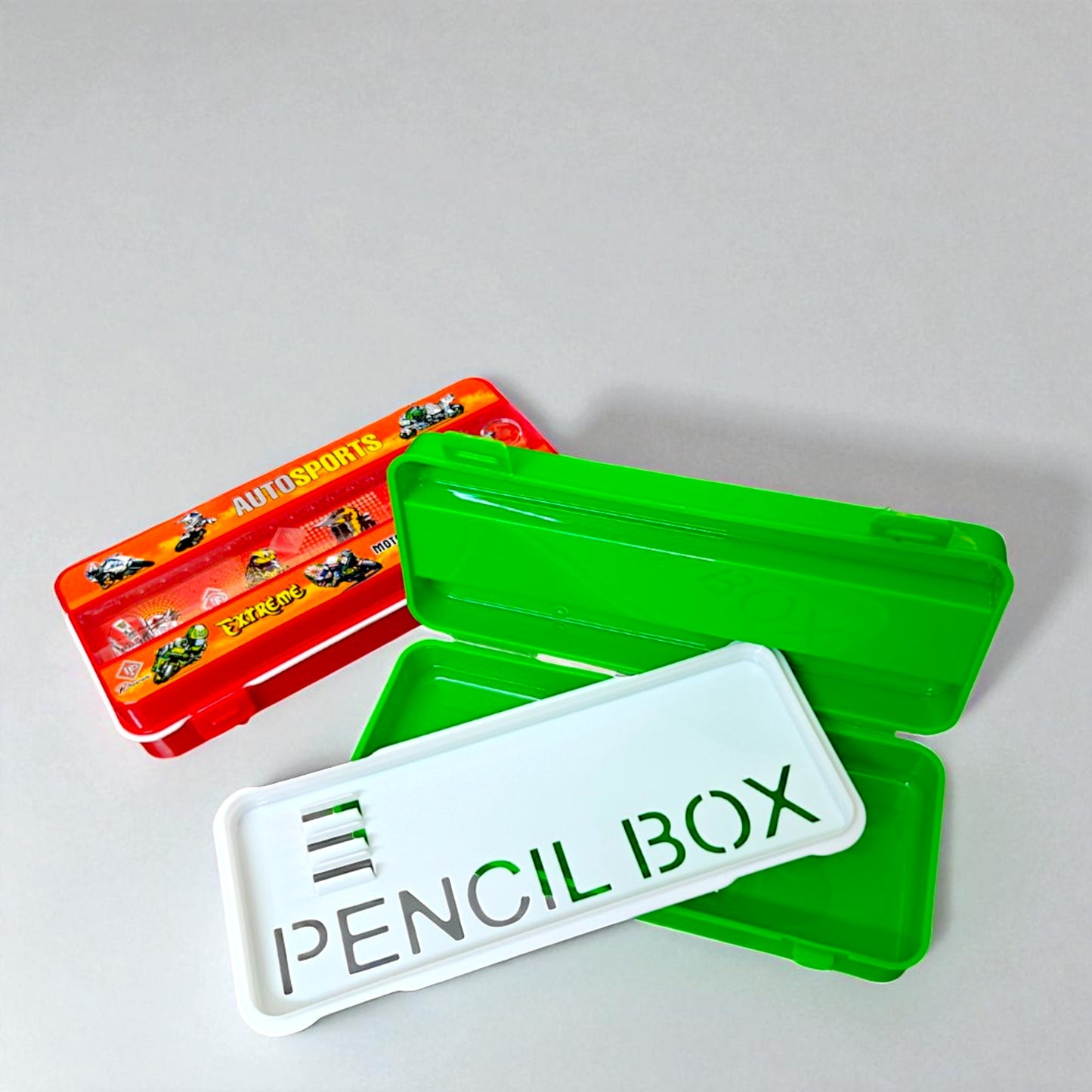 UK-0934 Ruler Compass Box Plastic Two Iron Balls Car Racing Game on Front School Pencil | Geometry | Stationery Box with Single Lock Dual Compartment and a Stencil Partition Tray
