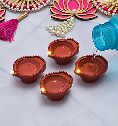 UK-0003    Water Sensor LED Diyas Candle with Water Sensing Technology E-Diya, Warm Orange Ambient Lights, Battery Operated